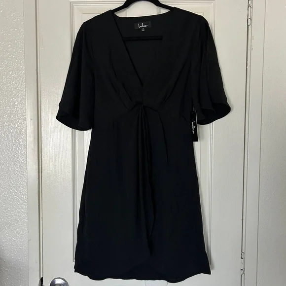 Lulu’s with this kiss black flutter sleeve mini dress - Picture 4 of 10